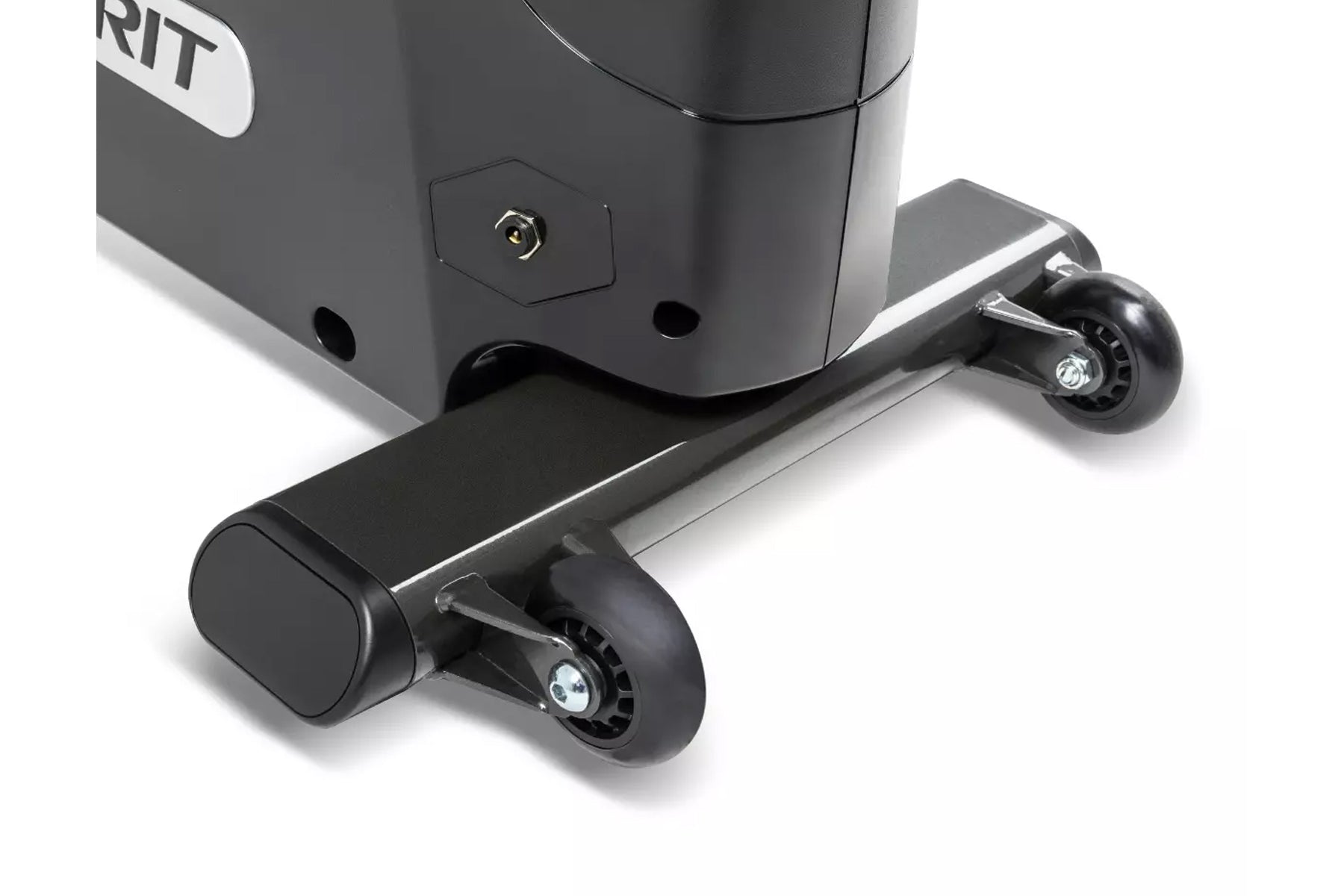 Close-up view of Spirit upright exercise bike base showing black frame with chrome accents, dual black wheels, and gold conne