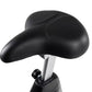 Black padded bicycle saddle with silver metal post and black adjustment knob on white background