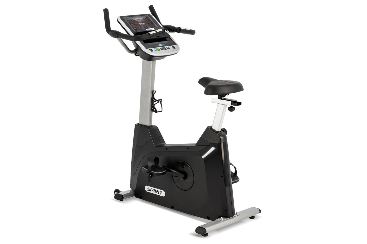 Spirit XBU55ENT upright stationary bike with black and silver frame, digital display console, adjustable black seat, and foot