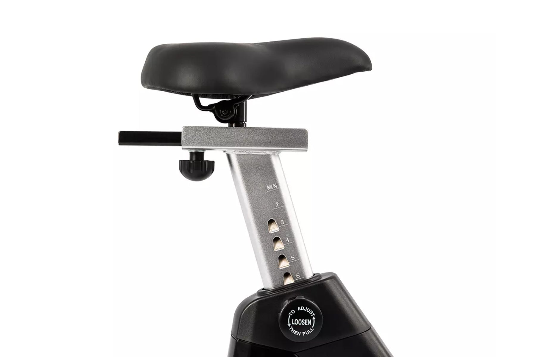 Upright stationary exercise bike with black padded saddle, gray metal frame with numbered adjustment holes, and black base wi