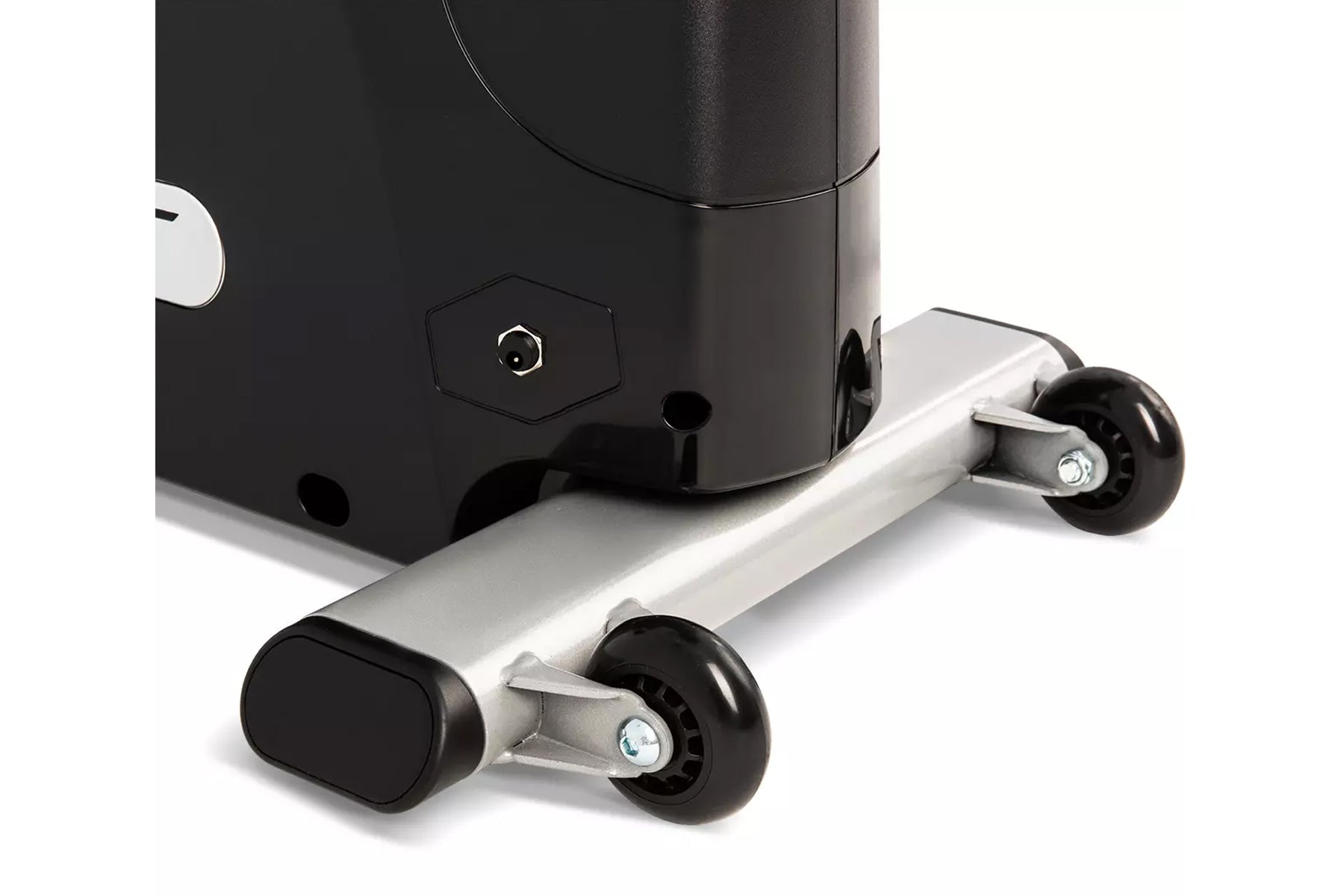 Black and silver stationary upright exercise bike with dual black wheels and metal frame, shown on white background