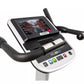 Spirit XBU55ENT upright exercise bike with black handlebars, white and black base, display console showing workout metrics, o
