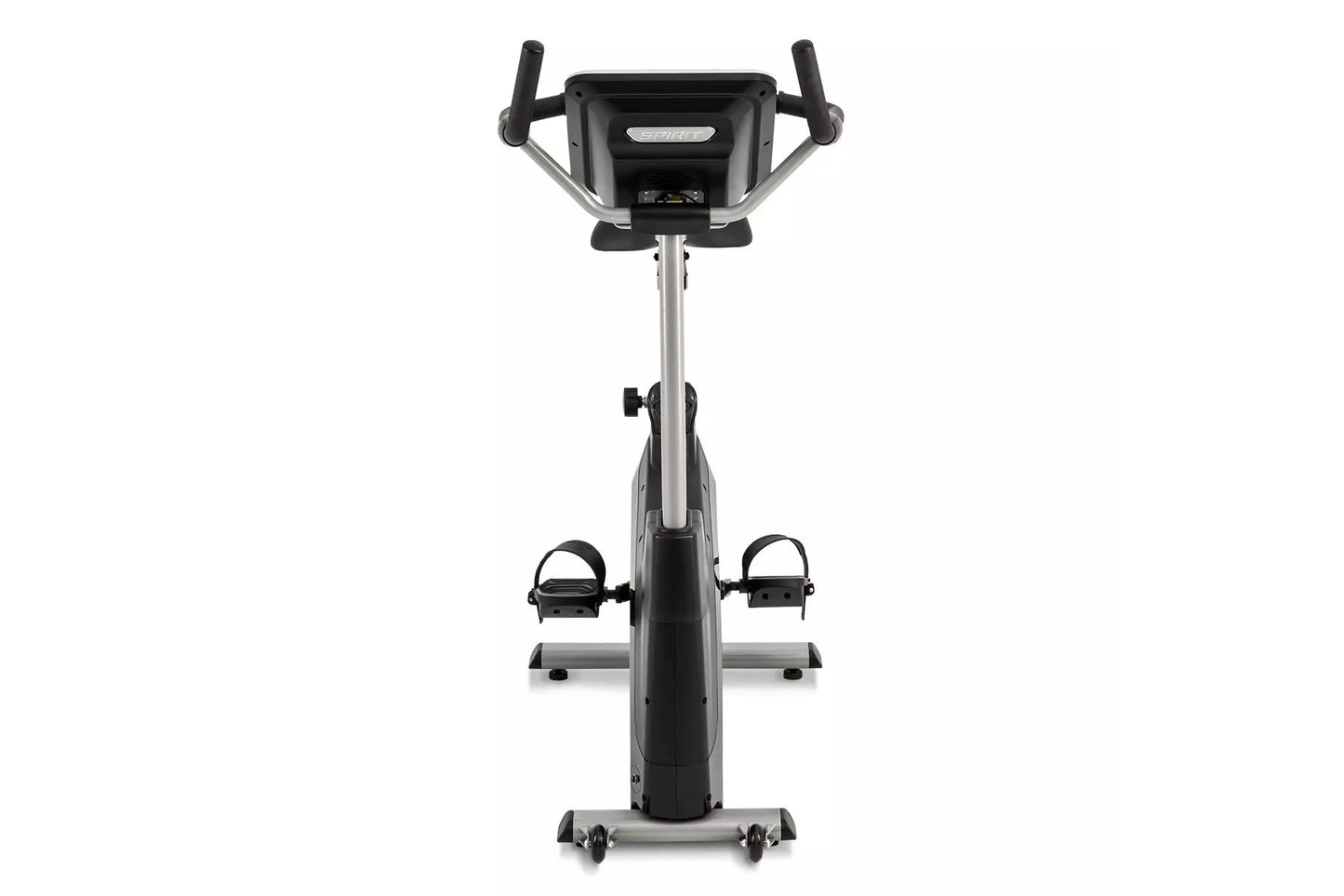 Spirit XBU55ENT upright exercise bike with black and silver frame, digital console, dual handlebars, and foot pedals on white