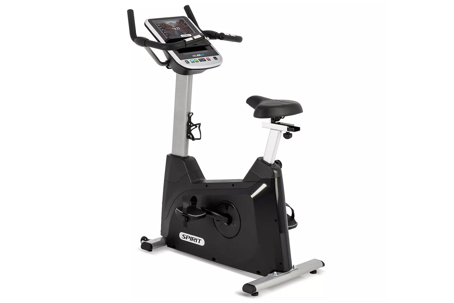 Spirit XBU55ENT upright stationary exercise bike with black base, silver column, digital display console, black handlebars, a