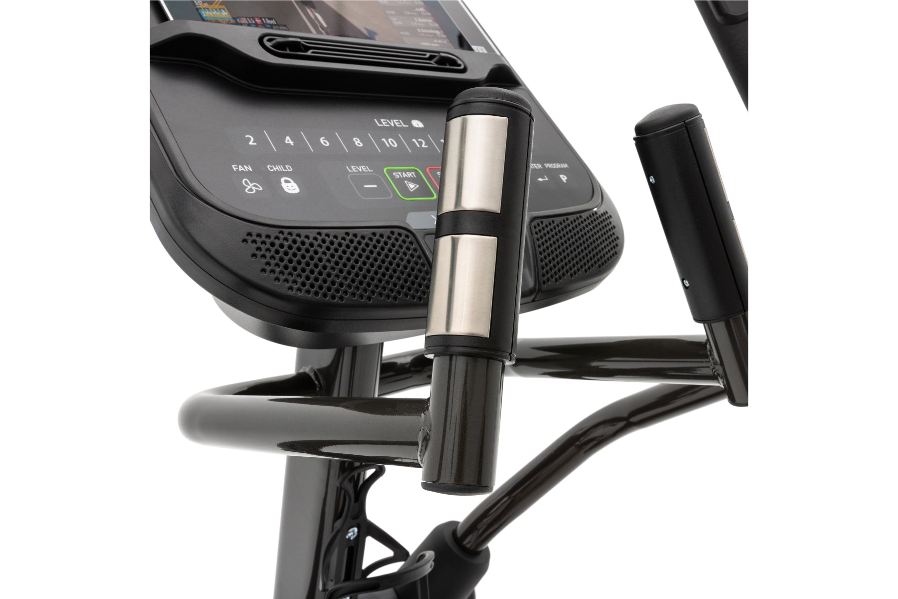 Spirit XE295 elliptical machine with digital display, stainless steel and black upright handlebars, and black foot pedals on 