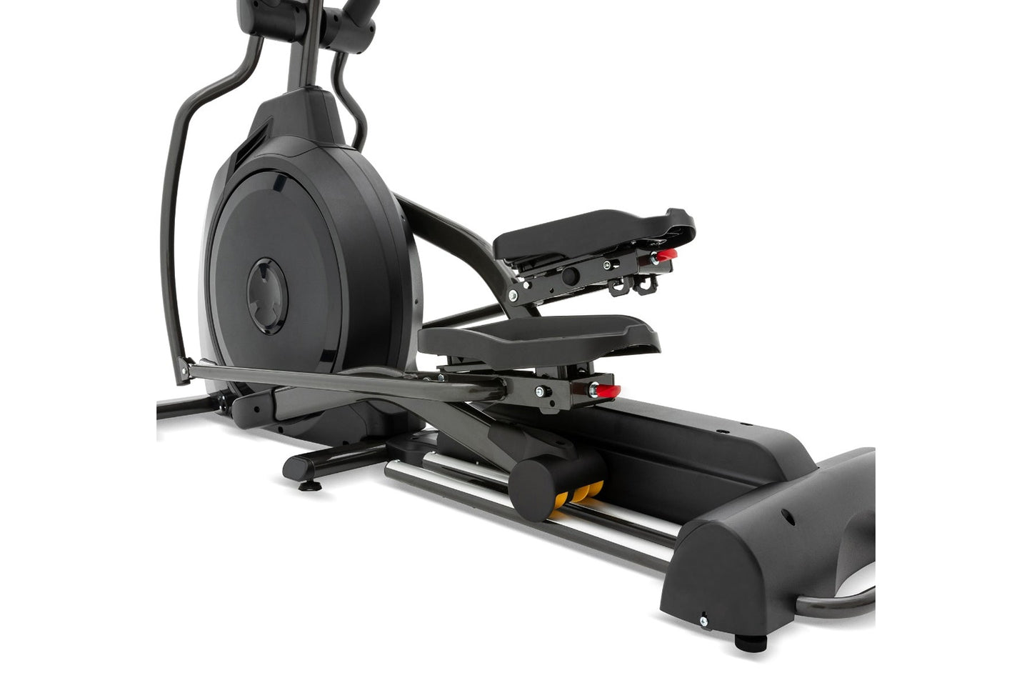 Black elliptical machine with large flywheel, adjustable footrests with red accents, and handlebars, on white background