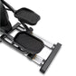 Black and silver elliptical machine with padded foot pedals and handle grips, shown on white background