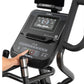 Spirit XE795 black elliptical machine with digital display showing workout metrics, hand grips with chrome accents, and numbe