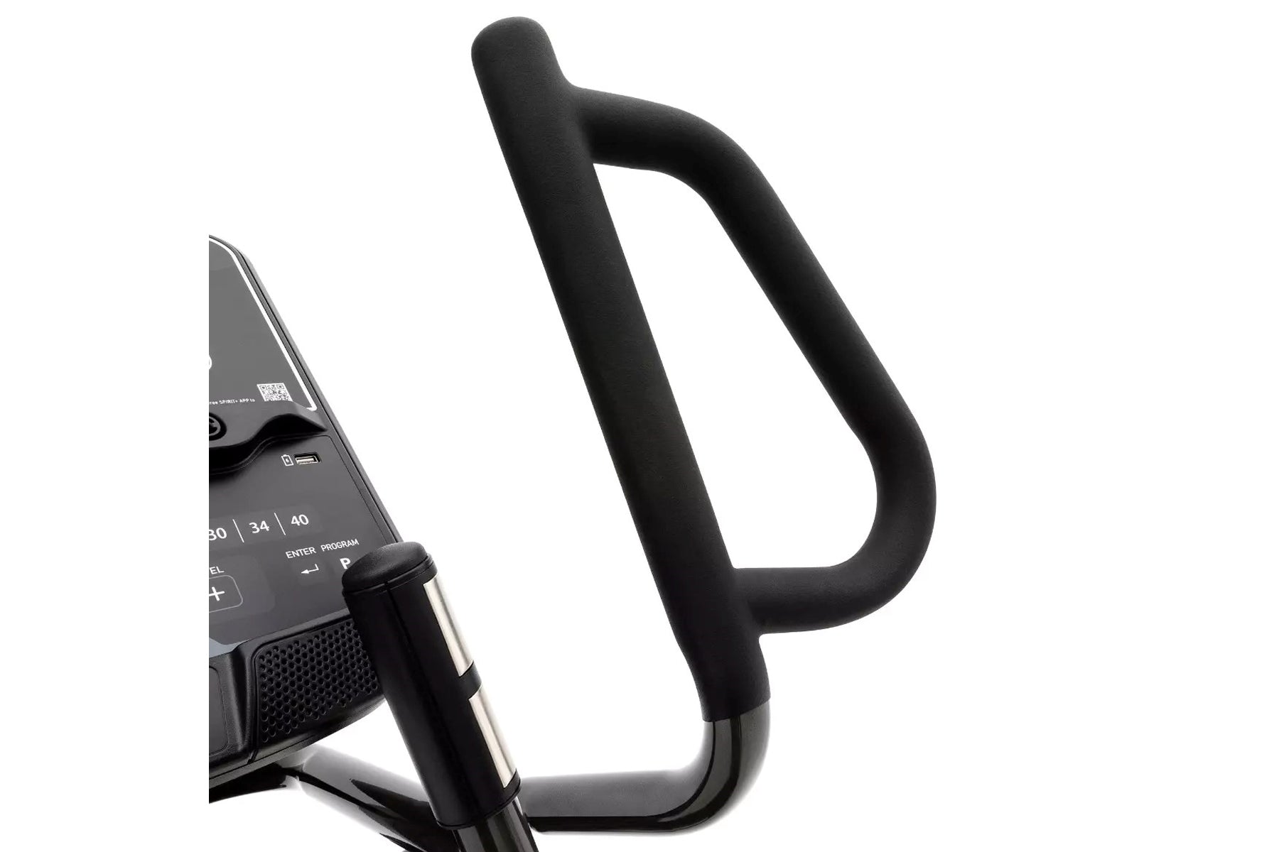 Black foam handlebar grips on Spirit XE795 elliptical machine with digital console visible on left side