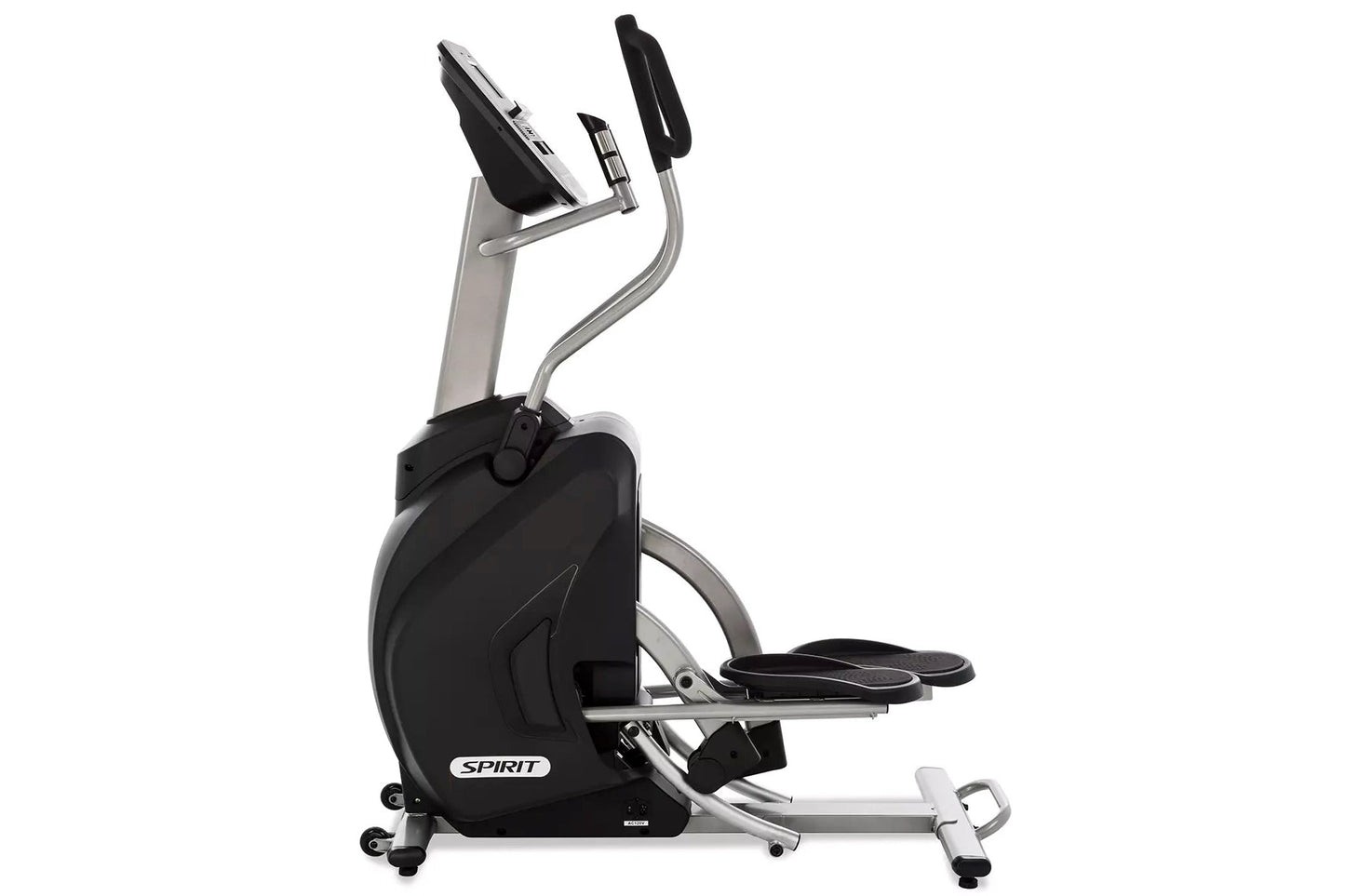 Spirit XS895 upright elliptical stepper trainer with black pedals and handles, silver frame, on white background