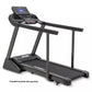 Black Spirit XT185 treadmill with digital display console, handrails, and running belt on white background