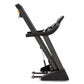 Black upright treadmill with curved handlebars, digital console, and wide base on white background