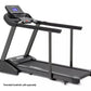 Black Spirit XT285 treadmill with digital display console, handrails, and running deck on white background