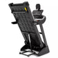 Spirit XT385 black treadmill with digital console, incline running deck, and yellow safety clip on white background