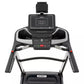 Spirit XT385 black and silver treadmill with digital console, control panel, and dual handrails on white background