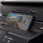 Smartphone displaying fitness tracking app with running workout data, positioned on black car dashboard with ventilation gril