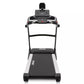 Spirit XT385 motorized treadmill with black and gray frame, digital console display, handrails with red buttons, and cushione