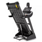 Spirit XT485 black treadmill with digital display console, yellow safety key, and diamond plate running deck on white backgro