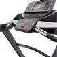 Spirit XT485 treadmill with black frame, digital display console showing workout metrics, and red start button on control pan