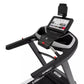 Black and gray Spirit stationary bike with digital console displaying fitness metrics on white background