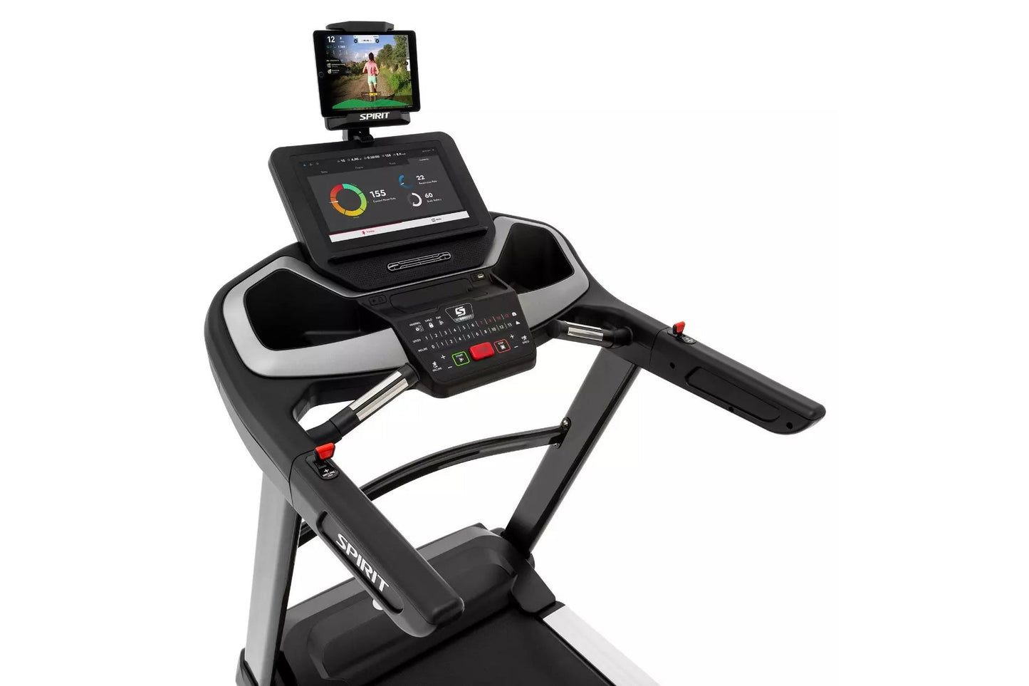 Spirit XT685ENT treadmill with black and silver frame, touchscreen display showing workout metrics, and tablet holder on whit