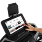 Spirit XT685ENT treadmill with touchscreen console displaying workout metrics, hand interacting with screen, black frame with