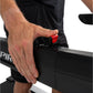 Man's hand operating red start button on black Spirit XT685ENT treadmill console