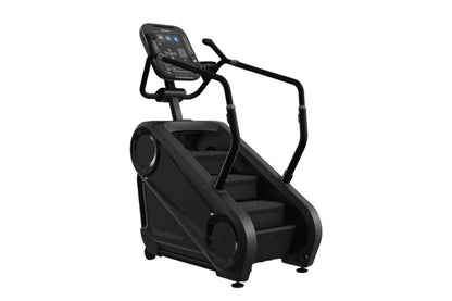 Black StairMaster Gauntlet 4G StepMill with digital console, handrails, and stepped climbing surface on white background