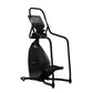 Black StairMaster 8-FreeClimber stair climbing machine with digital console and foot pedals on white background