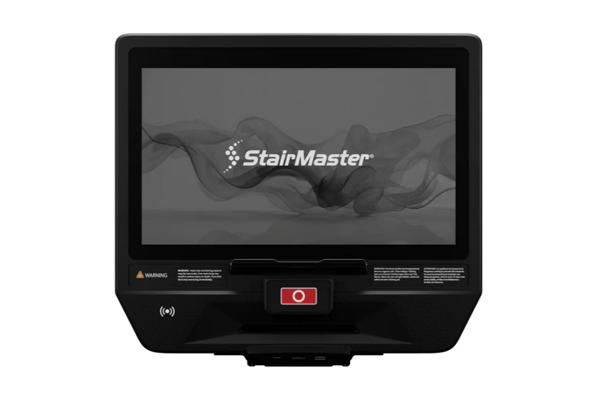 StairMaster 8Gx Gauntlet stair stepper with black frame, touchscreen display showing logo, and red start button on white back