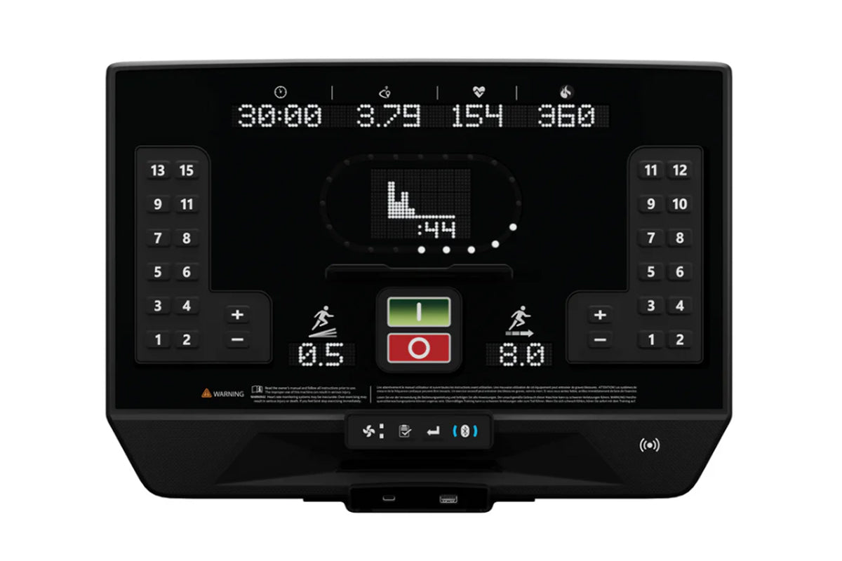 Black StairMaster 8Gx stair stepper console displaying digital metrics, incline controls, and green start and red stop button