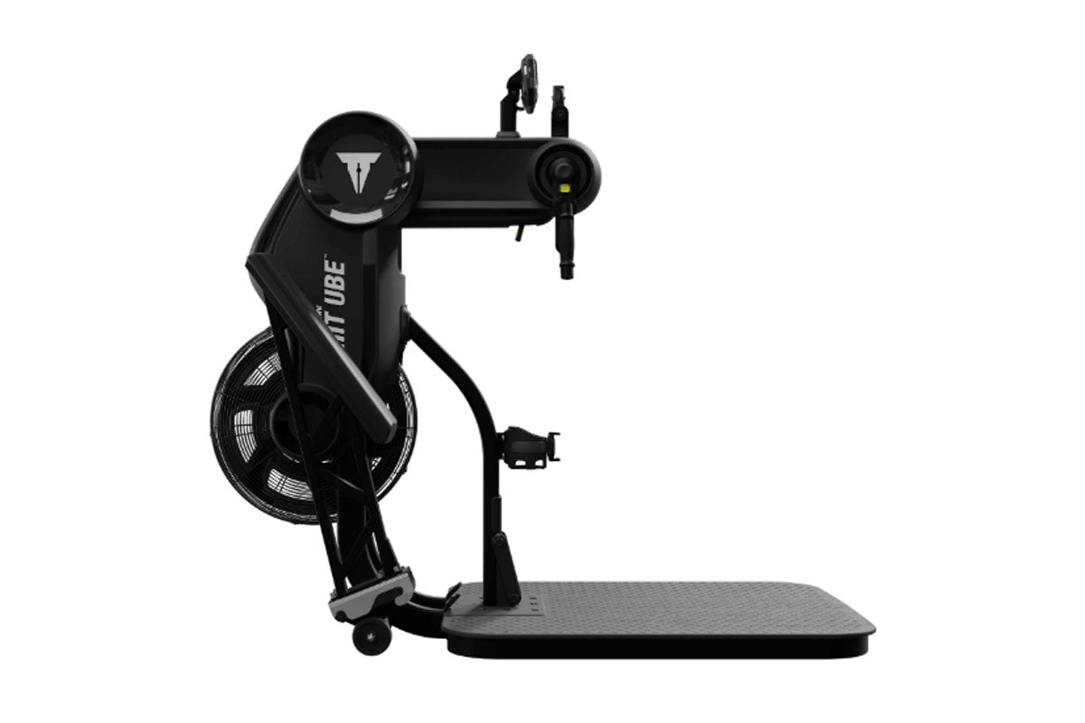 Black StairMaster HIIT UBE upper body ergometer with adjustable arm handles, digital display, and textured platform on white 