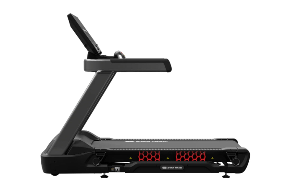 Star Trac 10 Series FreeRunner black treadmill with red digital display and adjustable handrail on white background