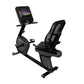 Black recumbent exercise bike with mesh back support, digital display console, and gray base on white background