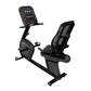 Black recumbent exercise bike with mesh backrest, digital console, and pedal straps on white background