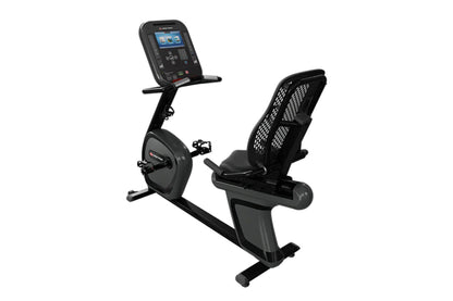 Black recumbent exercise bike with mesh back support, digital console with blue screen, and pedals, shown on white background