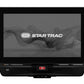 Black Star Trac treadmill console with touchscreen display showing startup logo and red power button