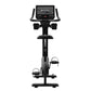 Star Trac 8UB upright exercise bike with digital display console, black frame, padded seat, handlebars with grips, and foot p