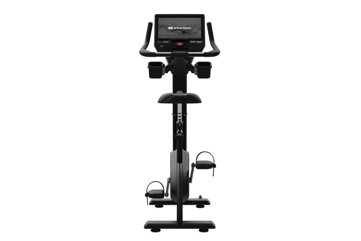 Star Trac 8UB upright exercise bike with digital display console, black frame, padded seat, handlebars with grips, and foot p