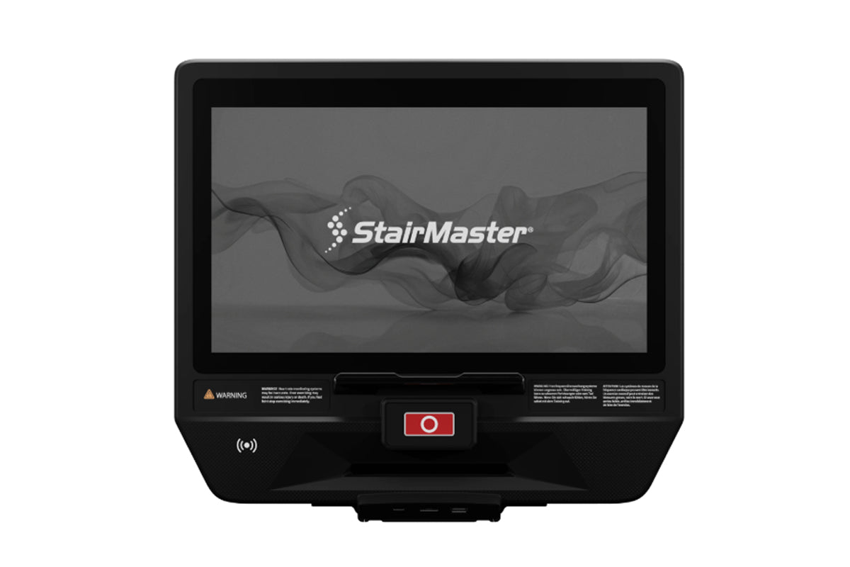 Black StairMaster cardio machine with digital touchscreen display and red power button on white background