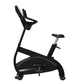 Black upright stationary exercise bike with padded seat, handlebar console, and digital display on white background