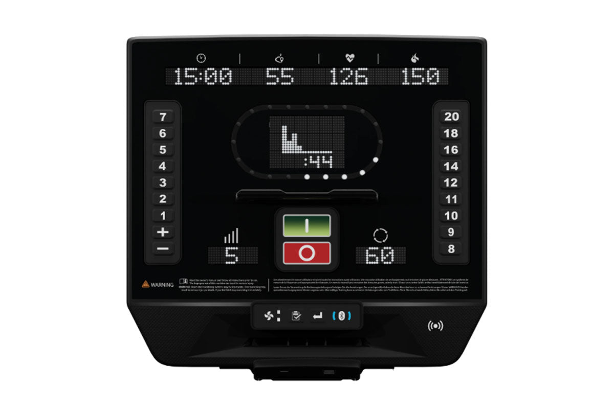 Black elliptical machine console displaying digital readouts, green and red control buttons, side number panels, and workout 