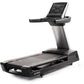 Black and silver motorized treadmill with digital display console and gray accent stripe on support column, on white backgrou