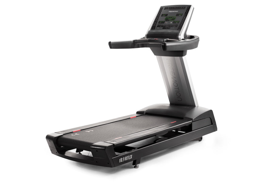 Black and silver motorized treadmill with digital display console and gray accent stripe on support column, on white backgrou