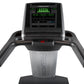 Freemotion t10.9b REFLEX treadmill with black and gray frame, digital console displaying green equalizer bars and workout met