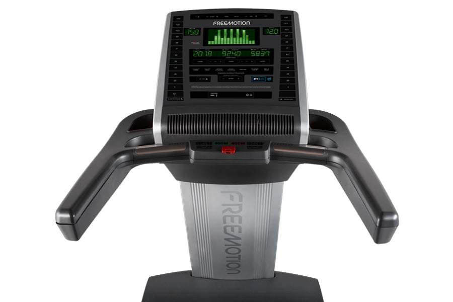 Freemotion t10.9b REFLEX treadmill with black and gray frame, digital console displaying green equalizer bars and workout met