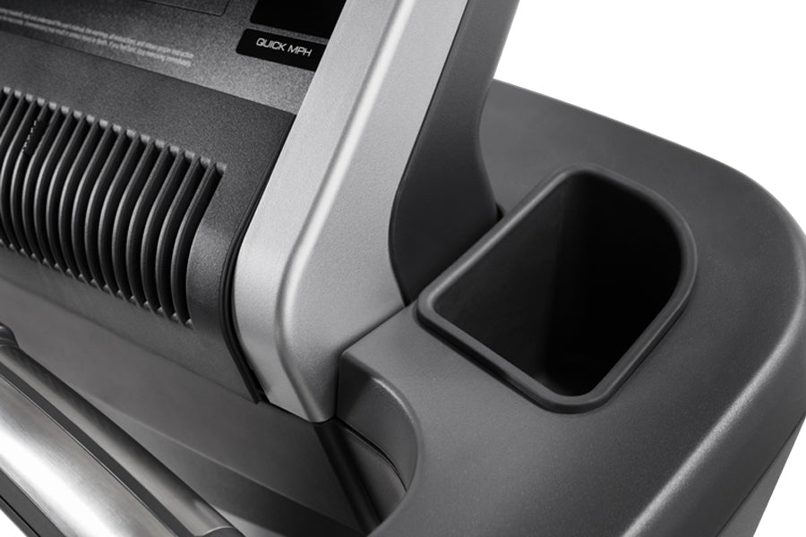Freemotion t10.9b REFLEX treadmill console with black and silver frame, featuring Quick MPH button and ventilation grilles