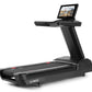 Black Freemotion t22.9 REFLEX treadmill with touchscreen display mounted on angled console, shown on white background