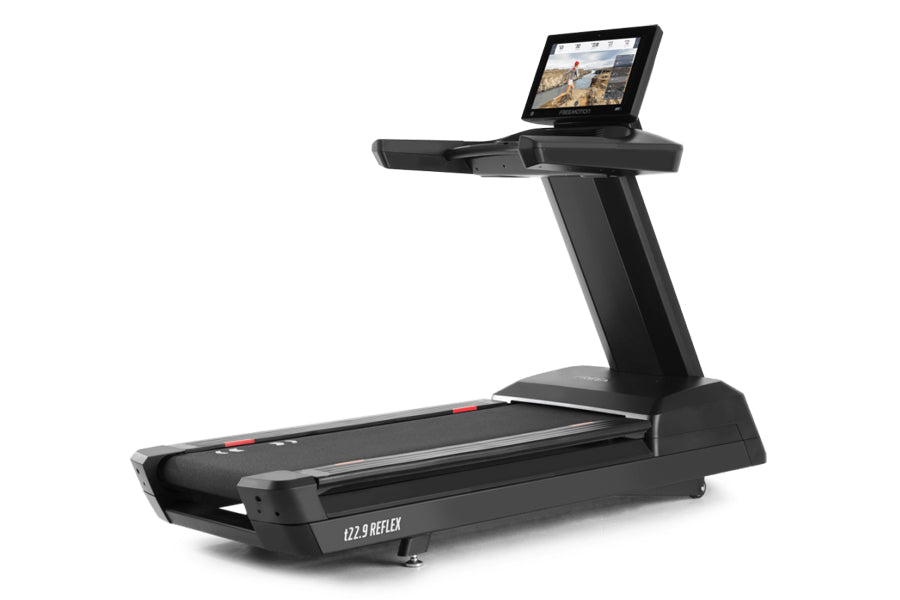 Black Freemotion t22.9 REFLEX treadmill with touchscreen display mounted on angled console, shown on white background