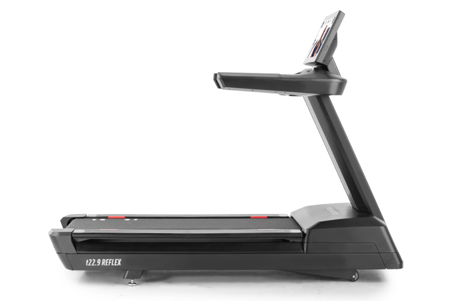 Black motorized treadmill with digital display console, red accent marks on running belt, and adjustable incline arm on white